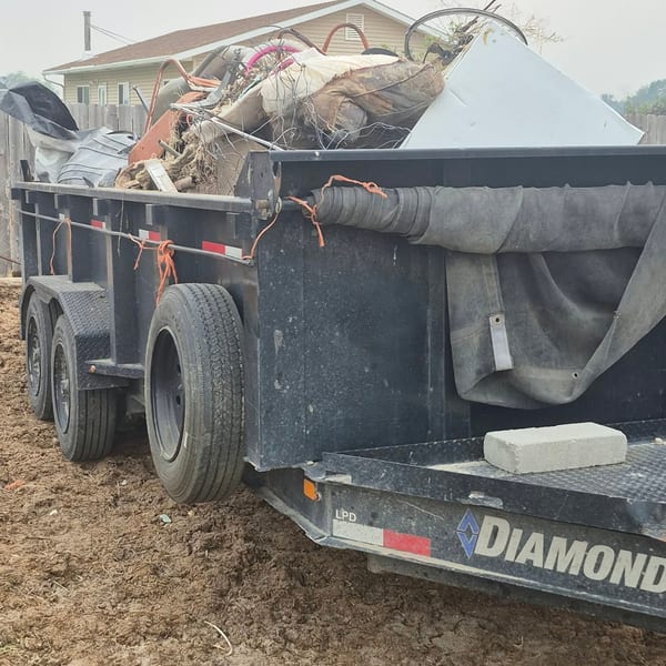 Elder property cleanup — weeds, fencing, tires, and yard safety assistance